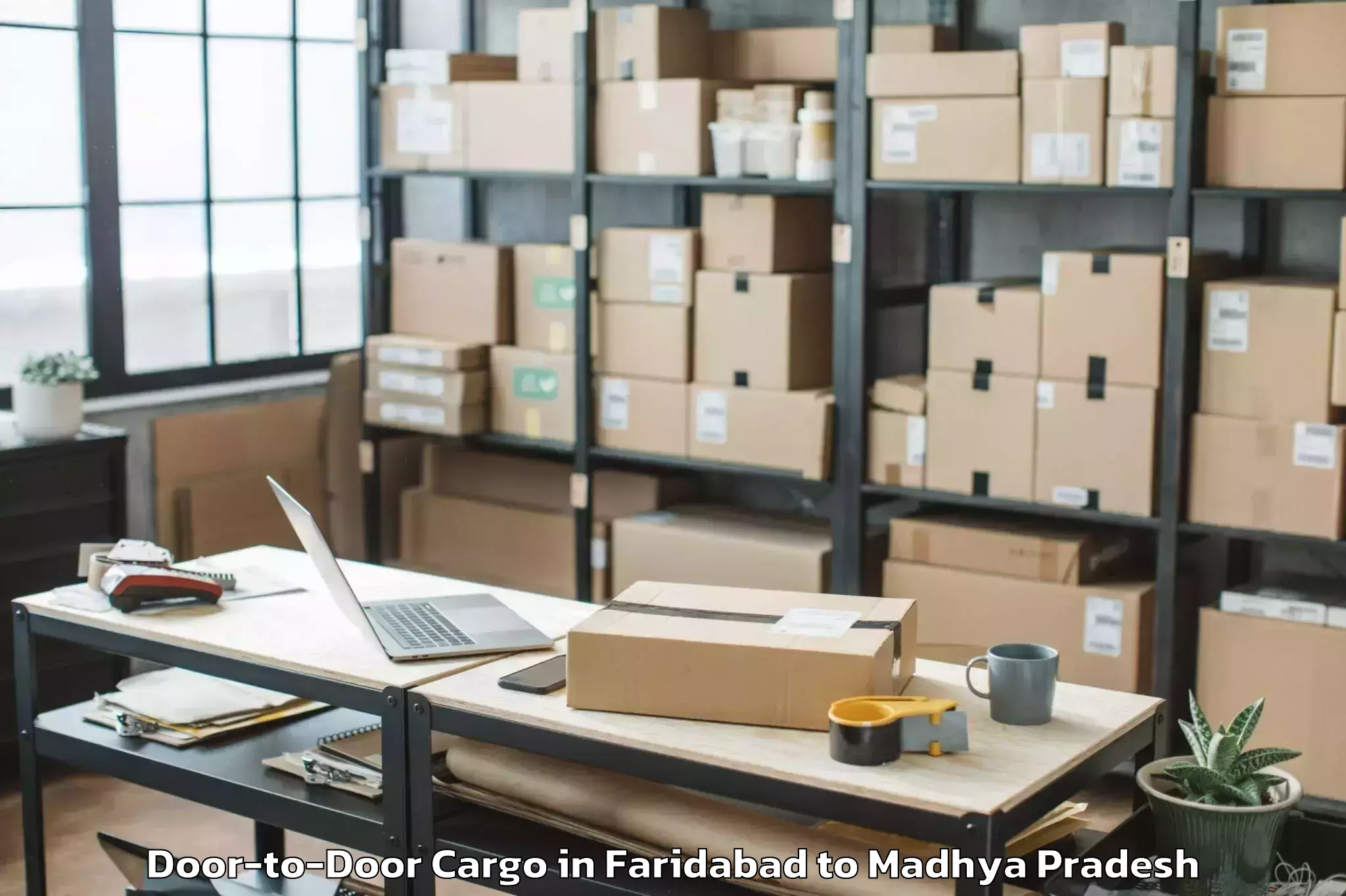 Efficient Faridabad to Chanderi Door To Door Cargo